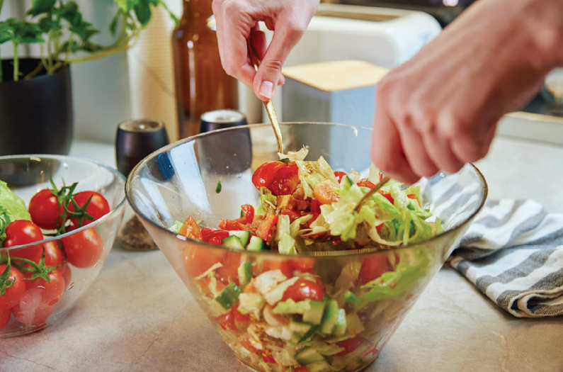 Preparing fresh green salad